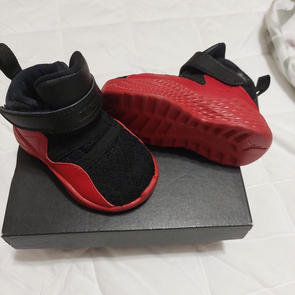 Jordan formula 23bt. Black with gym red also has a velcro strsp